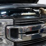how to open ford f250 hood from outside