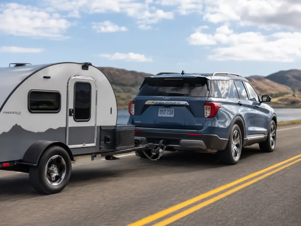 Ford Explorer Towing Capacity By Year Chart - 2026 2 Ford Explorer towing capacity by year shown with camper trailer