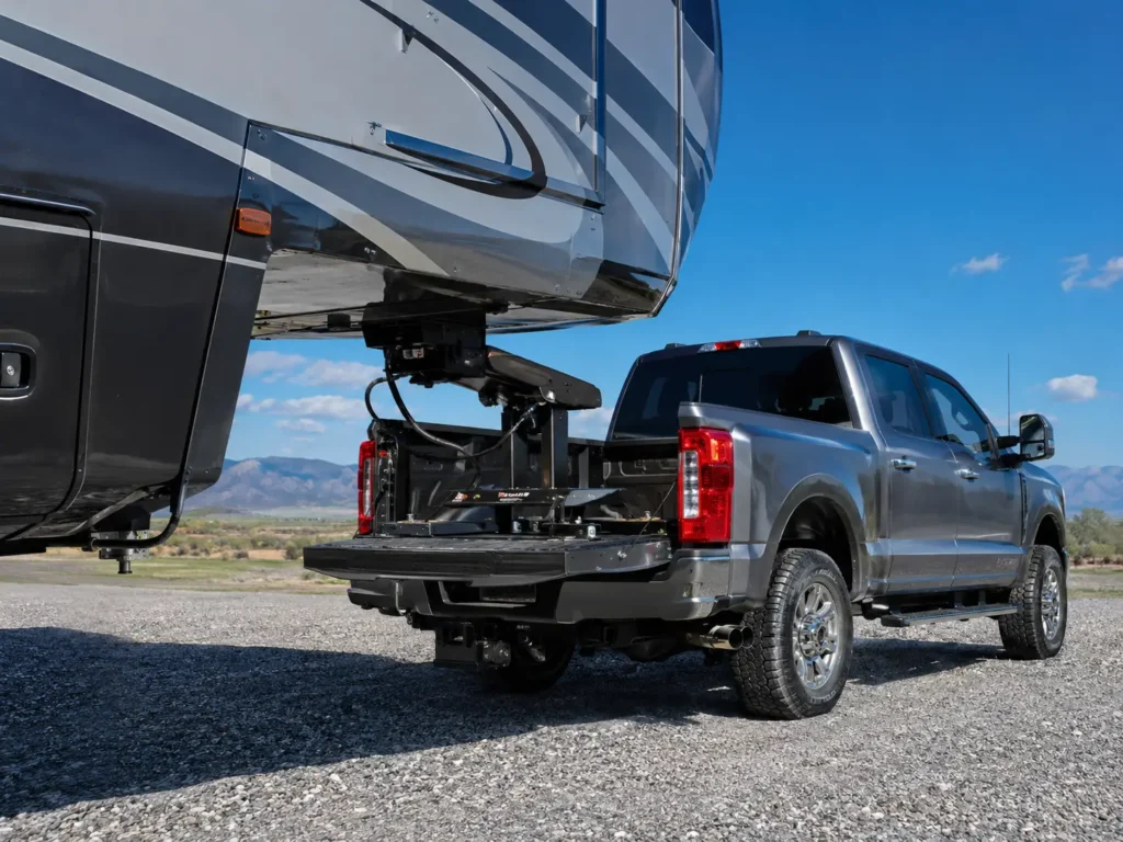 Ford F250 Towing Capacity By Year - Charts & Engine Specs 2026 2 Ford F-250 Super Duty towing a luxury fifth-wheel RV with bed-mounted hitch connection visible
