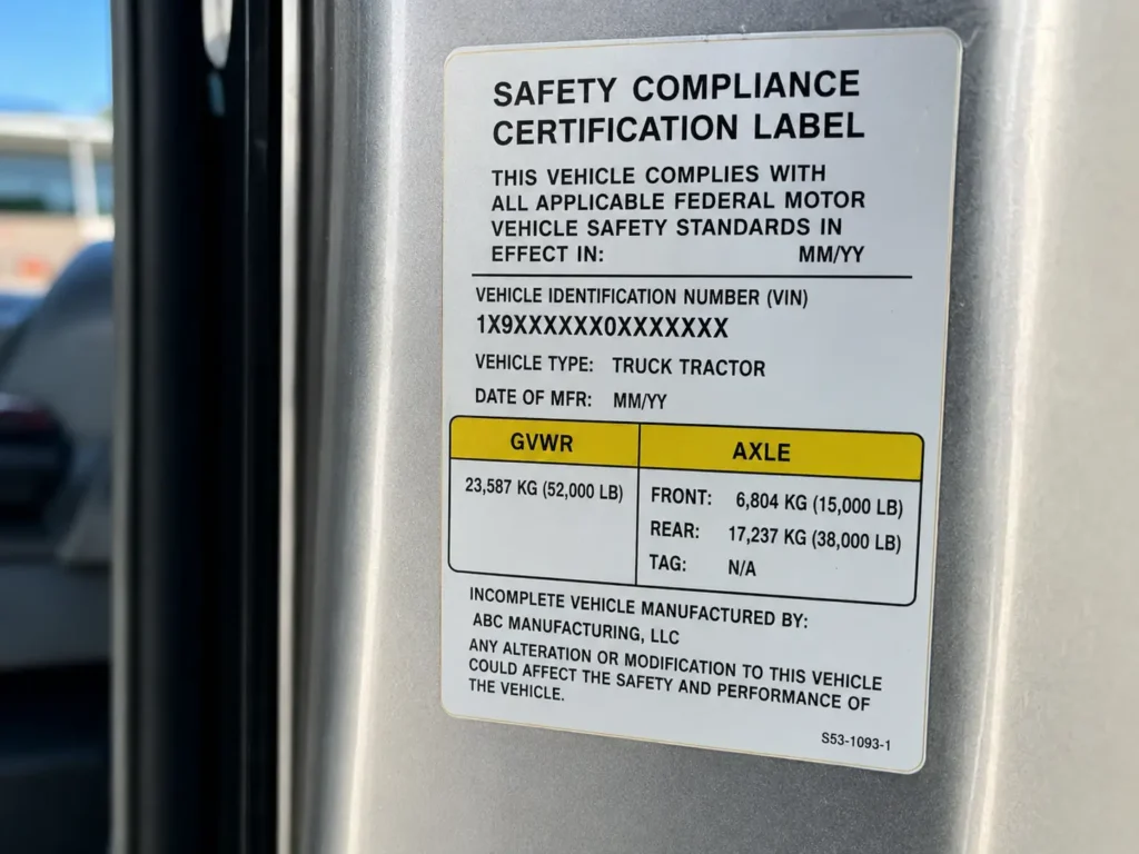 Ford F250 Towing Capacity By Year - Charts & Engine Specs 2026 5 Close-up of a truck door jamb safety compliance label showing GVWR and axle weight codes