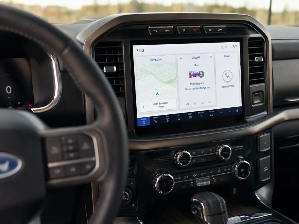 Ford SYNC Version Chart by Year and Model (2008–2026) 2 2021 Ford F-150 interior showing SYNC 4 touchscreen infotainment system on center console