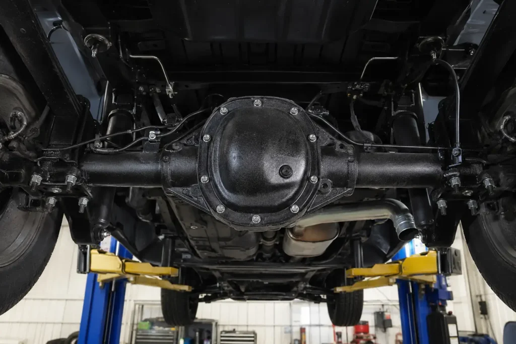 Ford F-150 rear axle housing width and differential shown underneath truck