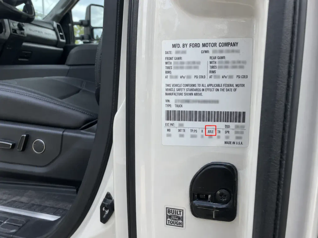 Ford F350 Gear Ratio Chart: 2011-2026 Year and Engine 3 Ford F350 door label showing axle code location for gear ratio