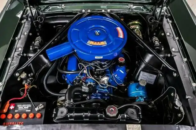 Restored Ford 289 V8 engine bay showing factory-style components for torque specifications